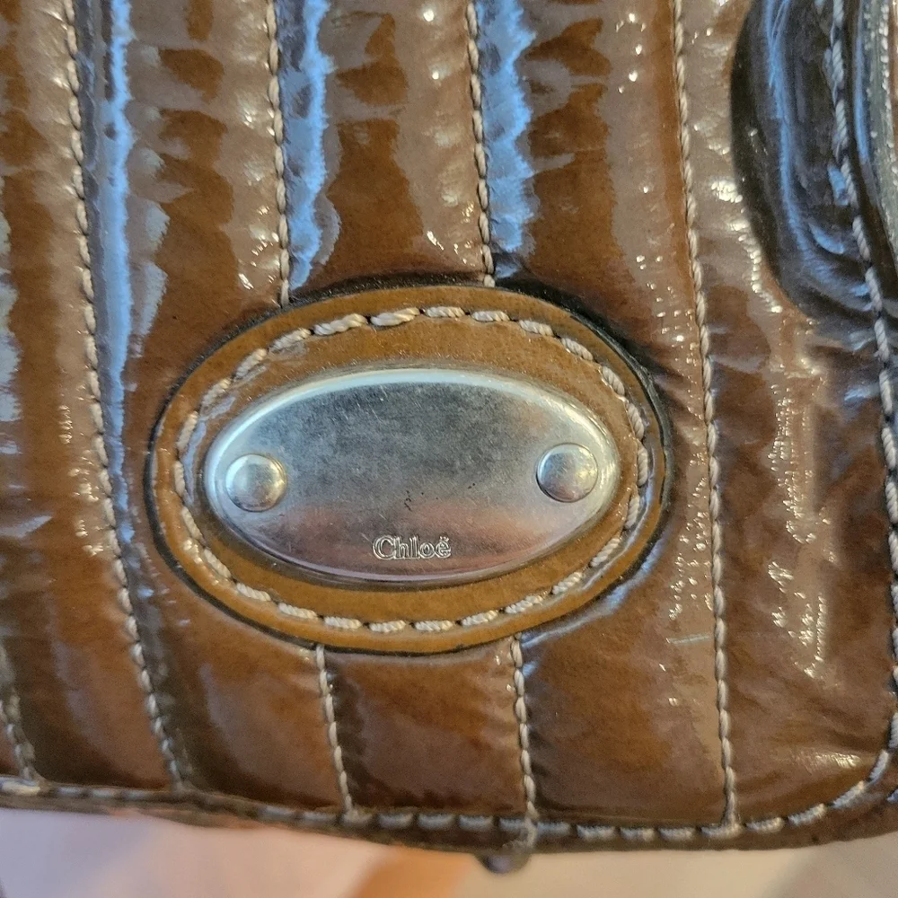 Chloe Bay Quilted Patent Leather Satchel Bag.